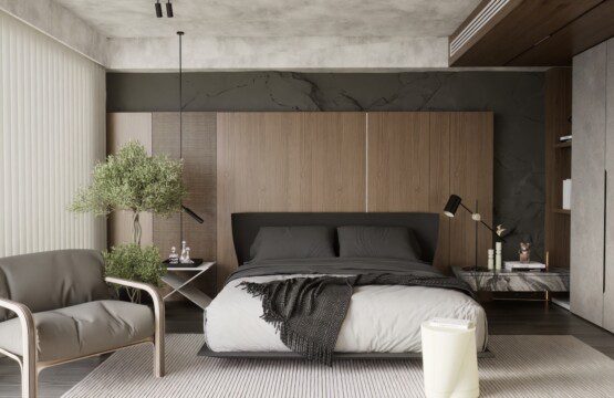 a bedroom with a bed and a chair