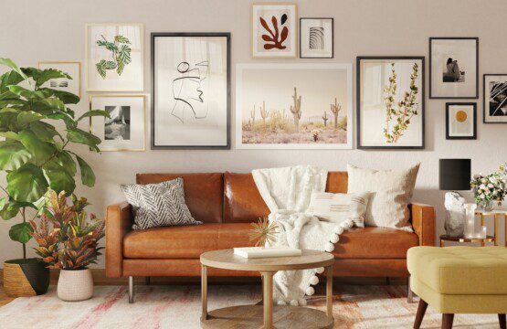 brown wooden framed white padded armchair